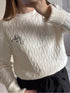 Pull torsadé écru J'ADORE